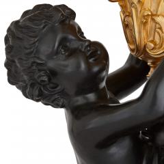 Pair of large Louis XVI style gilt and patinated bronze cherub candelabra - 3204546