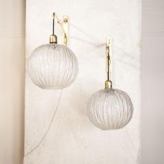 Pair of large brass and glass wall sconces 1960s - 4184786