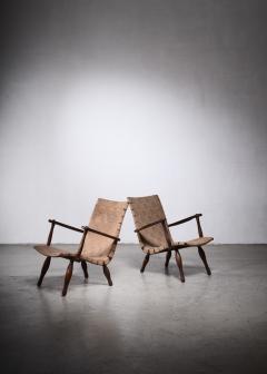 Pair of lounge chairs with webbed seating Sweden 1940s - 2403605