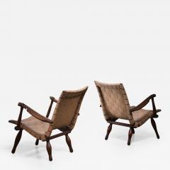 Pair of lounge chairs with webbed seating Sweden 1940s - 2407846