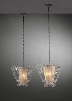 Pair of metal and fabric pendants - 3809205