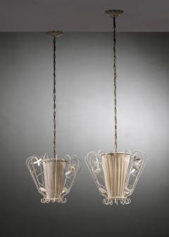 Pair of metal and fabric pendants - 3809206