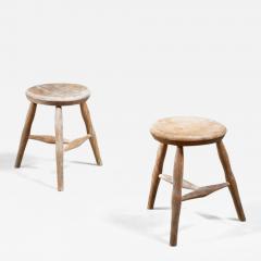 Pair of oak tripod stools in light oak - 972479