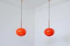 Pair of pendant chandeliers with wooden stem and red blown glass diffuser - 2434564
