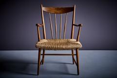 Pair of petit Dutch wooden lounge chairs with handwoven papercord seat - 3509131
