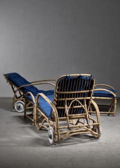 Pair of rattan lounge chairs with ottomans - 4746458