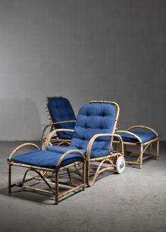 Pair of rattan lounge chairs with ottomans - 4746461