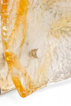 Pair of textured clear and amber glass sconces with a half round freeform design - 4163174