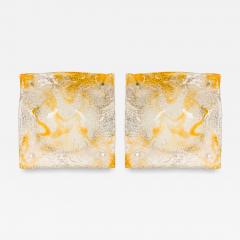 Pair of textured clear and amber glass sconces with a half round freeform design - 4178400