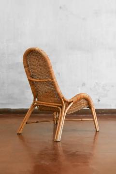 Pair of wicker armchairs with curved backrests 1980s  - 3707620