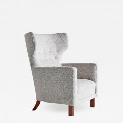 Paul Boman Paul Boman Wingback Chair in Pearl Boucl Fabric and Beech Finland 1940s - 1610425