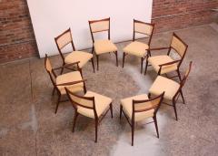 Paul McCobb Set of Eight Stained Mahogany and Cane Directional Dining Chairs by Paul McCobb - 799406