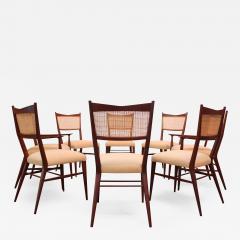 Paul McCobb Set of Eight Stained Mahogany and Cane Directional Dining Chairs by Paul McCobb - 843698