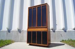 Paul McCobb Tall Cabinet with Glass Doors Leather Panels by Paul McCobb for H Sacks - 125042