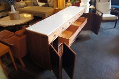 Paul McCobb Walnut Sideboard with White Marble Top and Leather Panels by Paul McCobb - 131824