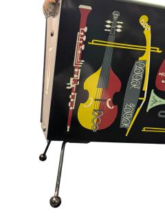 Piero Fornasetti MID CENTURY MUSICAL INSTRUMENT ENAMELED METAL MAGAZINE RACK FORNASETTI STYLE - 4409744