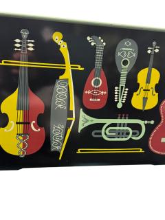Piero Fornasetti MID CENTURY MUSICAL INSTRUMENT ENAMELED METAL MAGAZINE RACK FORNASETTI STYLE - 4409746
