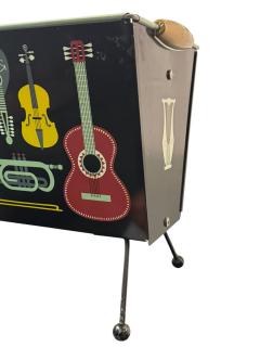 Piero Fornasetti MID CENTURY MUSICAL INSTRUMENT ENAMELED METAL MAGAZINE RACK FORNASETTI STYLE - 4409747