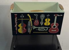 Piero Fornasetti MID CENTURY MUSICAL INSTRUMENT ENAMELED METAL MAGAZINE RACK FORNASETTI STYLE - 4409750