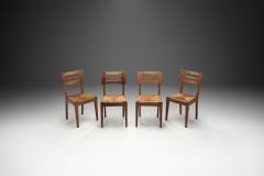 Pierre Cru ge A Set of Four Dining Chairs with Woven Seats by Pierre Cru ge France ca 1950s - 3949243