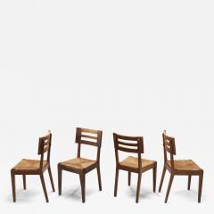 Pierre Cru ge A Set of Four Dining Chairs with Woven Seats by Pierre Cru ge France ca 1950s - 3962532