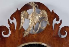 RARE OVAL CHIPPENDALE LOOKING GLASS WITH AN INSET CARVED PHOENIX - 3117830