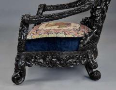Rare highly decorative profusely carved 19thc Indian armchair - 4752935