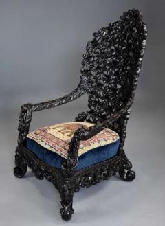 Rare highly decorative profusely carved 19thc Indian armchair - 4752940