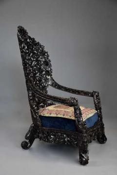 Rare highly decorative profusely carved 19thc Indian armchair - 4752943