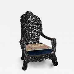 Rare highly decorative profusely carved 19thc Indian armchair - 4762328