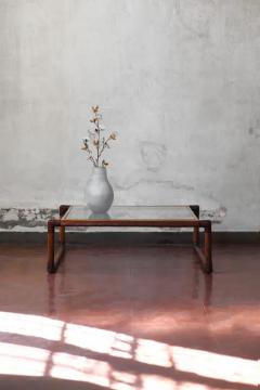 Rattan coffee table with leather bindings brass details and glass top 1970s - 3616124