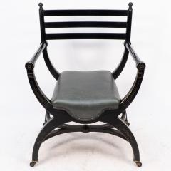 Richard Charles Richard Charles Aesthetic Movement Ebonised Elbow Chair with X Frame Stretcher - 4185832