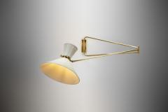 Robert Mathieu Extendable Brass Wall Lamp in the manner of Robert Mathieu Europe 1950s - 4292527