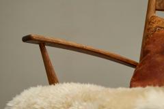 Rocking Chair in Solid Oak and Sheepskin France 1960s - 4394551