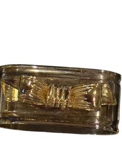 SET OF EIGHT SIVERPLATE GOLDTONE BOW DESIGN NAPKIN RINGS - 4557669