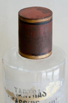 SET OF FOUR HAND BLOWN GLASS APOTHECARY BOTTLES WITH GILT AND RED TOPS - 3676520
