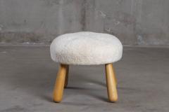SHEEPSKIN UPHOLSTERED OTTOMAN - 4449632
