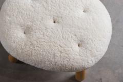 SHEEPSKIN UPHOLSTERED OTTOMAN - 4449634