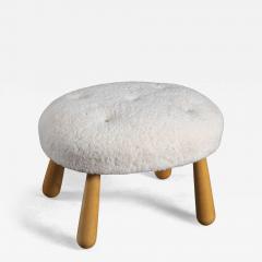 SHEEPSKIN UPHOLSTERED OTTOMAN - 4449793