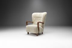 Scandinavian Mahogany Armchair in Sheepskin Scandinavia ca 1950s - 2318978