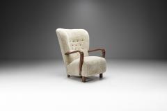 Scandinavian Mahogany Armchair in Sheepskin Scandinavia ca 1950s - 2318980