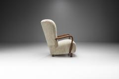 Scandinavian Mahogany Armchair in Sheepskin Scandinavia ca 1950s - 2318981
