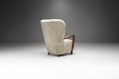 Scandinavian Mahogany Armchair in Sheepskin Scandinavia ca 1950s - 2318982