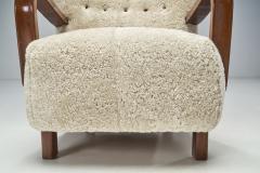 Scandinavian Mahogany Armchair in Sheepskin Scandinavia ca 1950s - 2318994