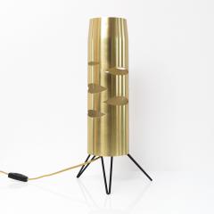 Scandinavian Modern cylindrical brass lamp with cutouts on a tripod base  - 1871303