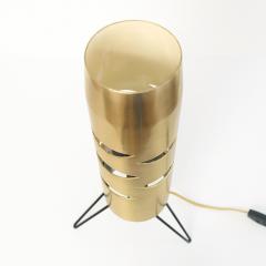 Scandinavian Modern cylindrical brass lamp with cutouts on a tripod base  - 1871305