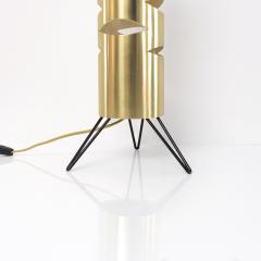 Scandinavian Modern cylindrical brass lamp with cutouts on a tripod base  - 1871308