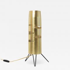 Scandinavian Modern cylindrical brass lamp with cutouts on a tripod base  - 1875416