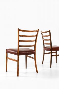 Set of 12 Dining Chairs in Rosewood and Leather 1960s - 4399647