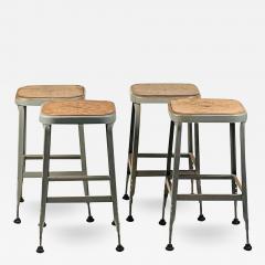 Set of 4 Adjustable Patinated Steel Counter Stools by Lyon Manufacturing - 3794633